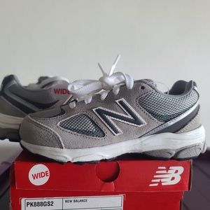 New in the box Grey new balance sneakers in size 12 toddler , wide.
